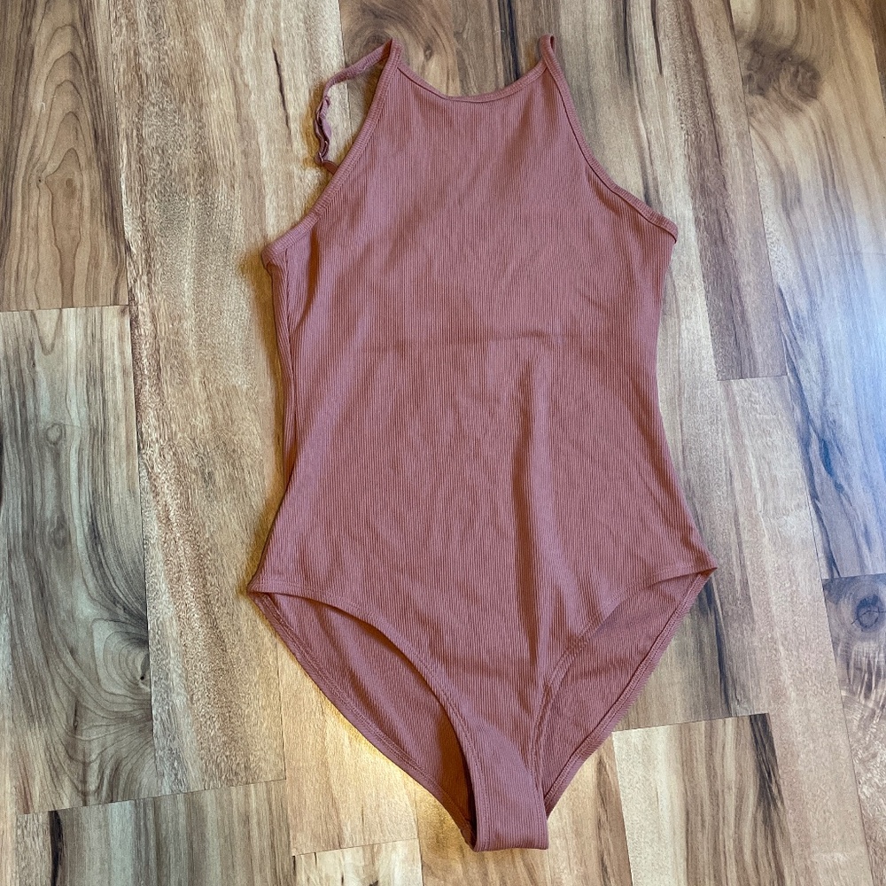 Orange bodysuit
